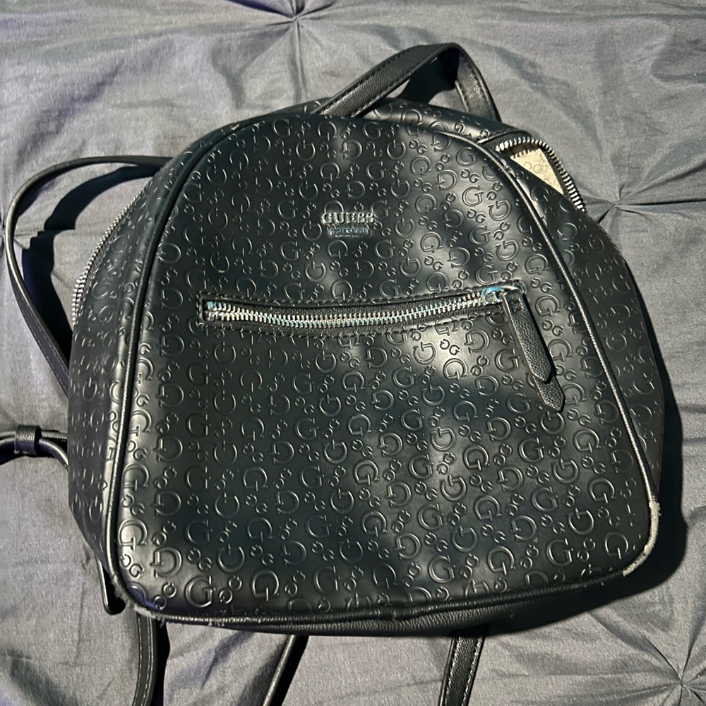 Black guess backpack.Only used several times.